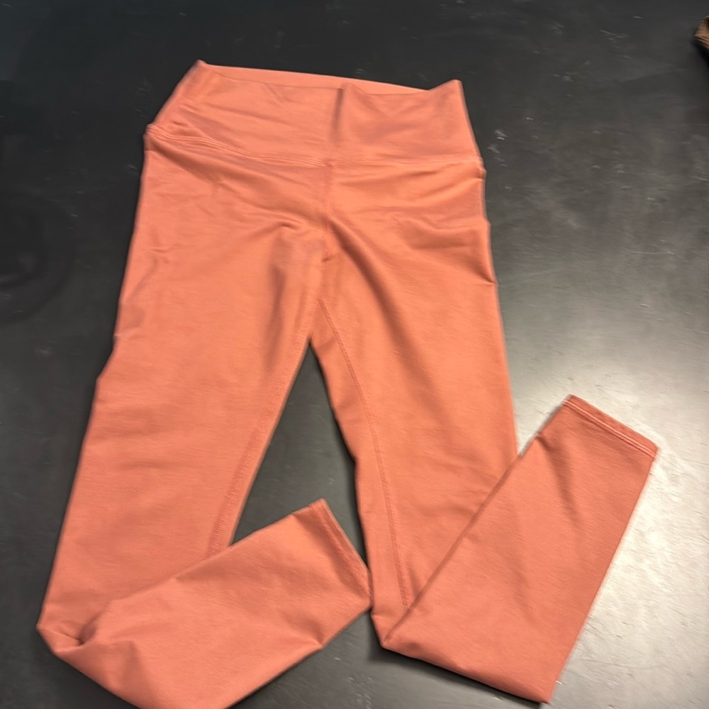 Alo Yoga, terracotta, high waisted size medium leggings very good used condition